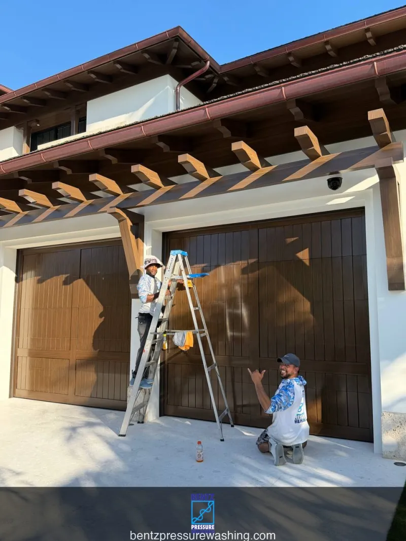 Bentz team carefully cleaning the exterior details of a South Florida home